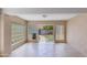 Well-lit sun room offers tile flooring and glass block accents; enjoy great backyard views at 4317 E Glenrosa Ave, Phoenix, AZ 85018
