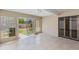 Bright sun room features glass block accents, ceramic tile floor, and access to the rear yard at 4317 E Glenrosa Ave, Phoenix, AZ 85018