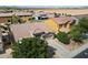 Aerial view of a well-maintained home featuring desert landscaping and a tile roof in a modern neighborhood setting at 43998 W Palo Abeto Dr, Maricopa, AZ 85138