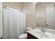 Bathroom with a shower and a dark wood vanity with white sink at 43998 W Palo Abeto Dr, Maricopa, AZ 85138