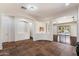 Expansive open floorplan offers views from the kitchen to the living room and backyard, perfect for entertaining at 43998 W Palo Abeto Dr, Maricopa, AZ 85138