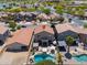 A beautiful aerial view of a two-story home with a private pool and landscaped backyard at 44158 W Cypress Ln, Maricopa, AZ 85138