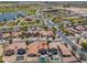 An aerial view of the property highlighting its proximity to the community park, lake, and amenities at 44158 W Cypress Ln, Maricopa, AZ 85138