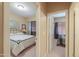 Inviting bedroom with a comfortable bed, soft lighting, and a calming atmosphere, providing a cozy retreat at 44158 W Cypress Ln, Maricopa, AZ 85138