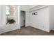 Bedroom featuring a window, carpet flooring, and closet with storage at 626 W Catclaw St, Gilbert, AZ 85233
