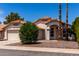 Charming single-story home with a two-car garage and a well-maintained front yard at 626 W Catclaw St, Gilbert, AZ 85233