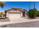 Charming single-story home with a two-car garage and a well-maintained front yard at 626 W Catclaw St, Gilbert, AZ 85233