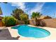 Relax in this private backyard oasis with a beautiful pool surrounded by mature landscaping at 626 W Catclaw St, Gilbert, AZ 85233