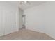 Bedroom featuring a closet, neutral carpet, and neutral paint at 708 E Mule Train Trl, San Tan Valley, AZ 85143