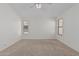 Bright bedroom featuring a ceiling fan and lots of natural light at 708 E Mule Train Trl, San Tan Valley, AZ 85143