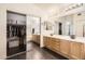 Bathroom features dual sinks, vanity and closet, offering a spa-like experience at 7239 E Madero Ave, Mesa, AZ 85209
