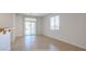 Bright and airy room with tile flooring and sliding door access to the backyard at 7318 W St Charles Ave, Laveen, AZ 85339