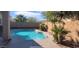 Enjoy the Arizona weather with a private pool and decorative plantings at 7318 W St Charles Ave, Laveen, AZ 85339