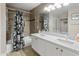 Bathroom showcasing a double vanity and a shower-over-tub combination at 7340 W Bronco Trl, Peoria, AZ 85383