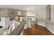Upstairs hallway with hardwood floors and views to the first floor at 7340 W Bronco Trl, Peoria, AZ 85383