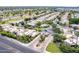 Stunning aerial view of the community showcasing the beautiful homes and lush landscaping at 7955 E Chaparral Rd # 141, Scottsdale, AZ 85250