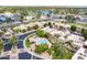 Beautiful aerial view of the community featuring lush landscaping, lakes, and green spaces at 7955 E Chaparral Rd # 141, Scottsdale, AZ 85250