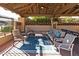Stylish poolside cabana featuring comfortable seating, ceiling fan, and mounted television for outdoor enjoyment at 7955 E Chaparral Rd # 141, Scottsdale, AZ 85250