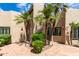 Charming courtyard with brick pavers, lush landscaping, and a tranquil ambiance at 7955 E Chaparral Rd # 141, Scottsdale, AZ 85250