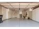 Spacious garage with ample storage cabinets and epoxy floors at 7955 E Chaparral Rd # 141, Scottsdale, AZ 85250