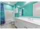 Fresh, colorful bathroom with a single sink vanity and tiled floors at 8010 W Atlantis Way, Phoenix, AZ 85043