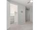 This is a bedroom with an open doorway that leads to a walk-in closet with shelves at 8010 W Atlantis Way, Phoenix, AZ 85043