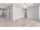 Living area features stylish light fixture, neutral paint, and an open floorplan at 8010 W Atlantis Way, Phoenix, AZ 85043