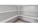 Walk-in pantry with bright white shelves at 8010 W Atlantis Way, Phoenix, AZ 85043