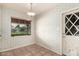 Bright breakfast nook featuring a window with natural light and a tiled floor at 8121 N 8Th Ave, Phoenix, AZ 85021