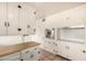 Cozy kitchen featuring white cabinets, stainless steel oven and butcher block countertop at 8121 N 8Th Ave, Phoenix, AZ 85021