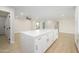 Open floor plan with a large kitchen island and plenty of space at 821 E Harmony Ave, Mesa, AZ 85204