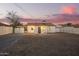 Exterior of backyard with gravel and white fence at 9042 N 3Rd Ave, Phoenix, AZ 85021