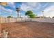 Spacious backyard featuring a fence with crushed gravel perfect for landscaping and outdoor activities at 9042 N 3Rd Ave, Phoenix, AZ 85021