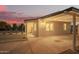 Charming single-story home with white painted brick, modern fixtures, covered parking, and desert landscaping at 9042 N 3Rd Ave, Phoenix, AZ 85021