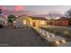 Charming house with walkway lighting, front yard landscaping, and white exterior paint at 9042 N 3Rd Ave, Phoenix, AZ 85021