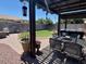 Backyard with a pergola, a grill, a hot tub and an outdoor dining table at 913 W Leadwood Ave, Queen Creek, AZ 85140