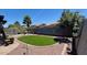 Wide backyard featuring lush artificial lawn, an artificial grass area and gravel landscape at 913 W Leadwood Ave, Queen Creek, AZ 85140