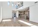 Expansive open-concept with high ceilings, great lighting, and flowing access to the modern kitchen at 100 W Northern Ave # 12, Phoenix, AZ 85021