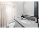 Bathroom with shower-tub combination, contemporary vanity with stone countertop at 10206 E Texas Ave, Mesa, AZ 85212