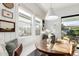 Cozy breakfast nook with built-in seating, natural light, and charming decor at 10206 E Texas Ave, Mesa, AZ 85212