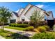 Beautiful exterior elevation featuring a well-manicured lawn and a charming, modern home design at 10206 E Texas Ave, Mesa, AZ 85212