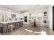 Spacious kitchen with a large island, stainless steel appliances, and a breakfast nook at 10206 E Texas Ave, Mesa, AZ 85212
