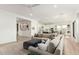 Bright, open concept living area with views into the kitchen and a light and airy feel at 10206 E Texas Ave, Mesa, AZ 85212