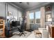Contemporary home office with a gray accent wall and natural light at 10206 E Texas Ave, Mesa, AZ 85212