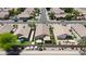 Bird's-eye view showcases the home's layout, landscaped backyard, and proximity to the street at 1049 N Monterey St, Gilbert, AZ 85233