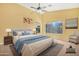 Virtually staged primary bedroom with plush bedding, neutral tones, and ample natural light at 1049 N Monterey St, Gilbert, AZ 85233