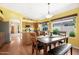 Eat-in kitchen featuring granite countertops, stainless steel appliances, and natural light at 1049 N Monterey St, Gilbert, AZ 85233