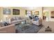 Comfortable living room featuring stylish furniture, elegant decor, and abundant natural light at 1049 N Monterey St, Gilbert, AZ 85233