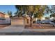 Charming single-story home featuring a low maintenance desert landscape and attached two-car garage at 10645 W Piccadilly Rd, Avondale, AZ 85392