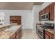 Granite countertops and stainless steel appliances highlight this spacious kitchen at 11611 N 149Th Ln, Surprise, AZ 85379